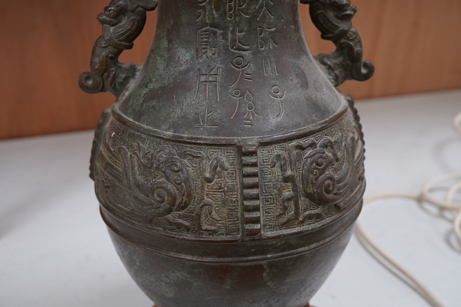 A Chinese archaistic bronze vase mounted as a table lamp, 62cm total